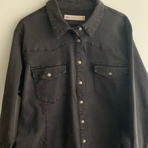 Stretch black denim button down shirt.